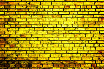 Texture of golden brick wall high contrasted