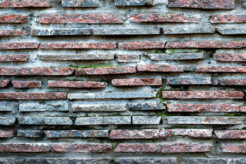 Red and blue marble stone brick wall detailed texture background cold filtered