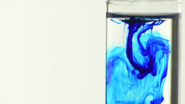 Methylene blue fall in water of two test tube laboratory