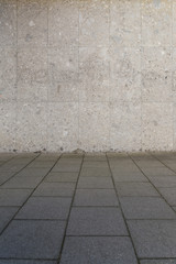 Fototapeta premium grauer Boden und sand Wand 