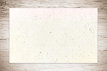 Blank mulberry paper on vintage wood background