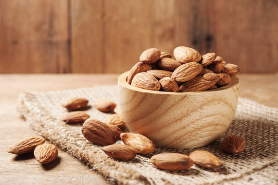 Almond snack fruit in wooden bowl still life