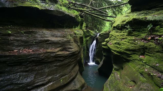 Robinson Falls, sometimes called &ldquo;Corkscrew Falls," is a secluded waterfall plunging into a narrow mossy gorge in the Hocking Hills of Ohio.