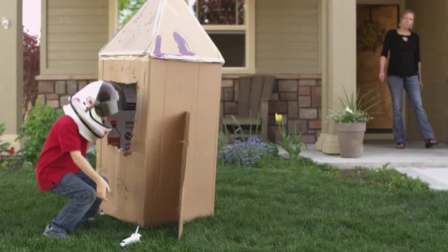 Little boy pretending to be astronaut