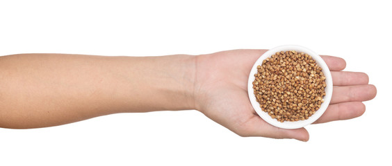 hand with buckwheat