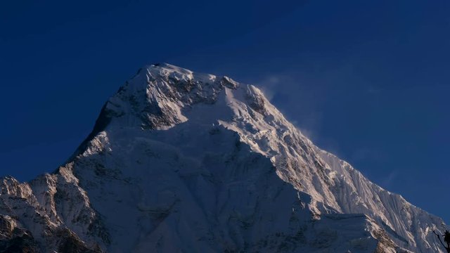 Himalayas Nepal mountain peak. Time-lapse 4k video nature, background. Twilight sunrise and clear sky.