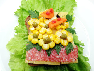 creative vegetable sandwich with cheese and sausage