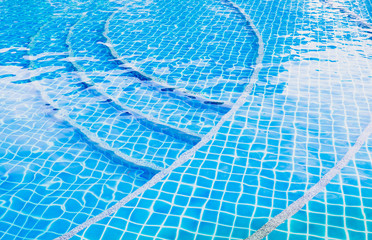 Blue wave  ripped water in swimming pool