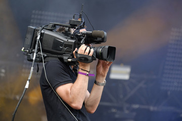 Obraz premium cameraman caméra vidéo filmer hd cadrer tv clip scène musique