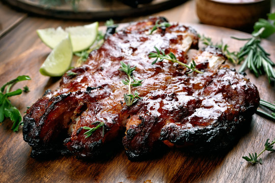 Barbecue pork ribs on wooden board