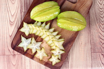 Star apples on wood.