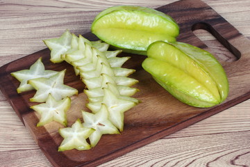 Star apples on wood.