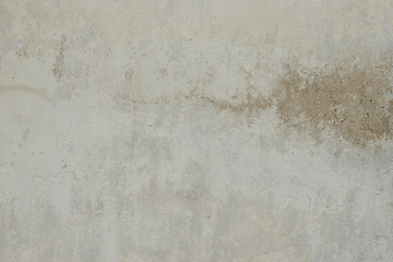 Wall fragment with scratches and cracks