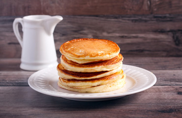Stack of classic pancakes on plate