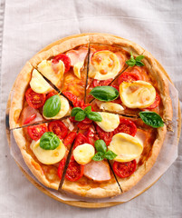 Mozzarella, tomato and smoked chicken homemade pizza