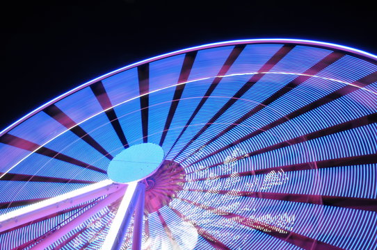 Spinning Ferris Wheel At Night Light