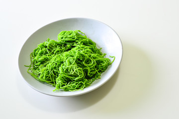 Green Noodles in the White Dish, Preparation of Raw Food