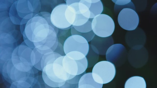 Blue, Blurred, Bokeh Lights Background. Abstract Sparkles. Full HD Loop 1080p