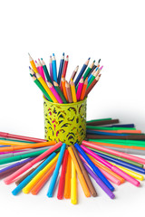 Fototapeta premium colored pencils and felt-tip pens on a white background