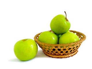 Ripe green apples in a basket.