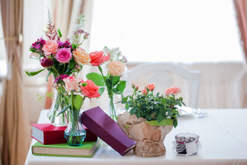 Wedding banquet, small restaurant. Floral decor in red, informal style.