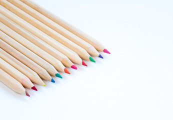 Art wooden pencils on a white background © Michalis Palis