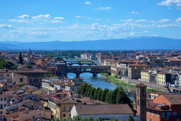 Naklejka premium cityscape of Florence, italy / Arno river and old bridge (ponte vecchio)