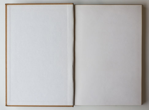 Blank Book Opened To The First Page.