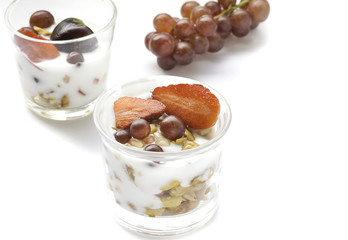 A food is yogurt on white background.