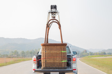 Car ride with the hot air balloon basket prepare to fire up the