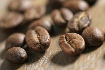 coffee beans on oak wood background