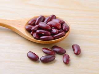red bean in wood spoon