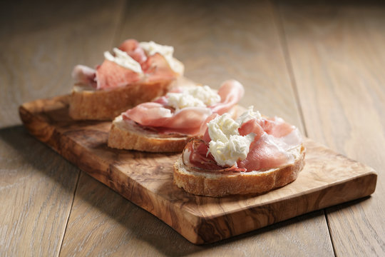 simple ciabatta slices with speck and mozzarella