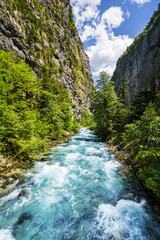 Fototapeta na wymiar Landscape in Abkhazia with Caucasian ridge and river