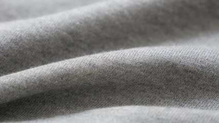 Sweat shirt or pants fine gray fabric texture close-up 4K 2160p 30fps UltraHD tilting footage - Cotton and polyester pattern of training cloth slow tilt 4K 3840X2160 UHD video