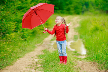 little girl with red umbrella