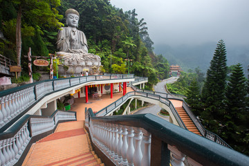 Genting Highlands, Malaysia - AUGUST 19, 2016: Large stone Buddha statue at Chin Swee Caves Temple in Genting Highlands, Pahang, Malaysia - 119222739