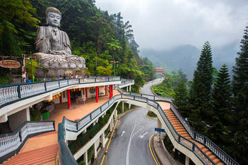 Genting Highlands, Malaysia - AUGUST 19, 2016: Large stone Buddha statue at Chin Swee Caves Temple in Genting Highlands, Pahang, Malaysia