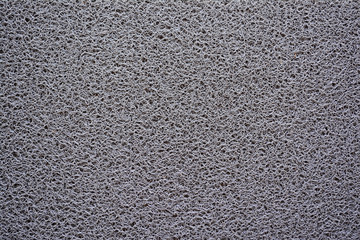 Gray doormat texture background.