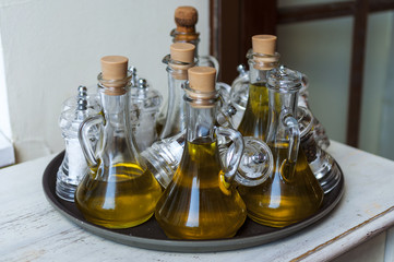 Olive oil on the wooden table in Italy