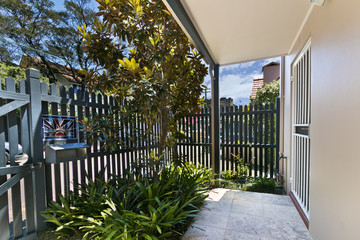 back yard with outdoor seating and barbecue with family