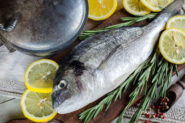 Fish with spices. A vertical image.