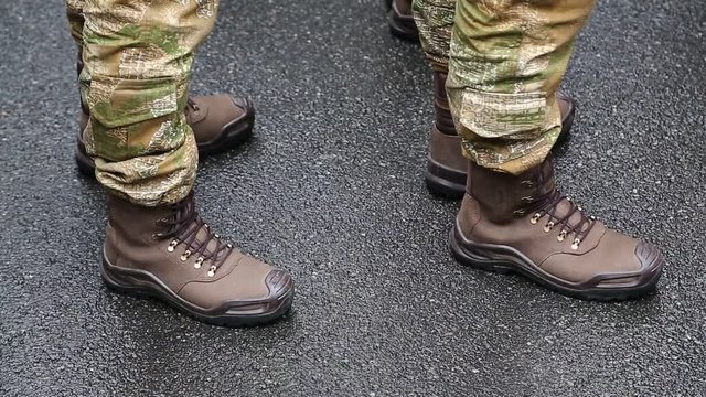 Soldiers in military uniform. Feet of soldiers. Servicemen at the military parade