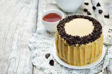Pumpkin and chocolate layer cake with salted caramel cream chees