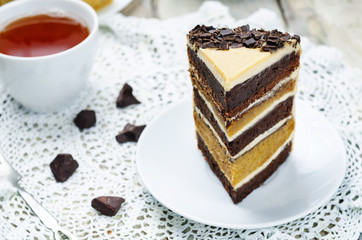 Pumpkin and chocolate layer cake with salted caramel cream chees