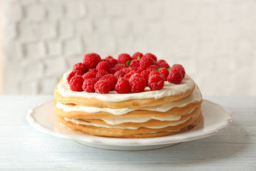 Tasty berry cake on the table