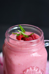 Summer cool drink, a smoothie with raspberry and peach 