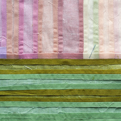 Quilt in green and pink tones