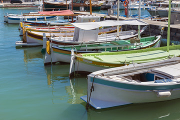 Fototapeta na wymiar Row of traditional boats in Cassis, France