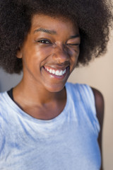 Fototapeta premium Beautiful young African woman smiling.